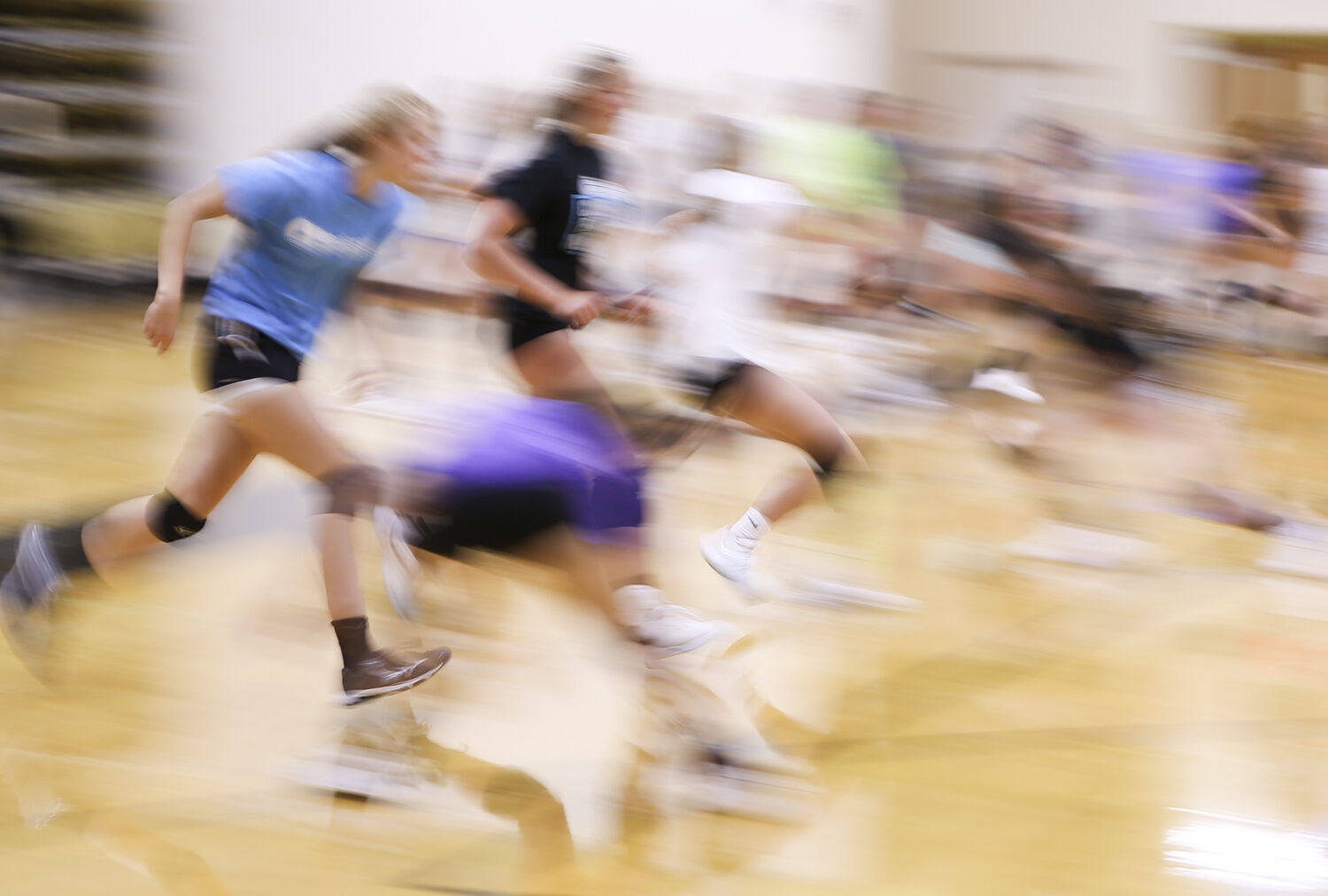 The volleyball team finished practice with conditioning drills